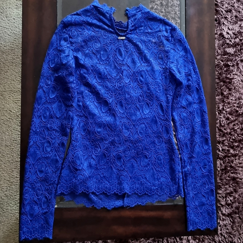 Guess brand,Beautiful, sexy long sleeve blue top.